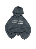 Premier Vintage dark grey hoodie with Aaron Copland School of Music logo, drawstring hood, and front pouch pocket.