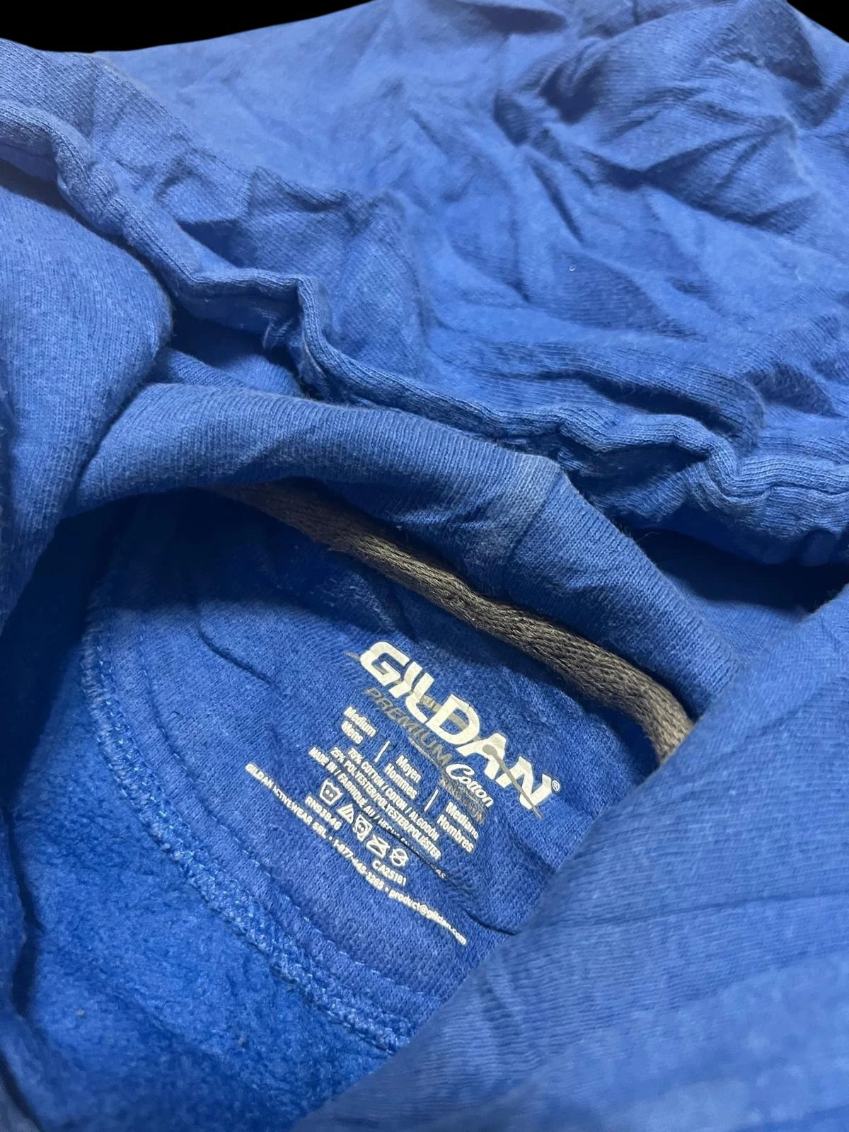 Premier Vintage blue Gildan hoodie with STORM 30 graphic. Pullover style with drawstring hood and front pocket.