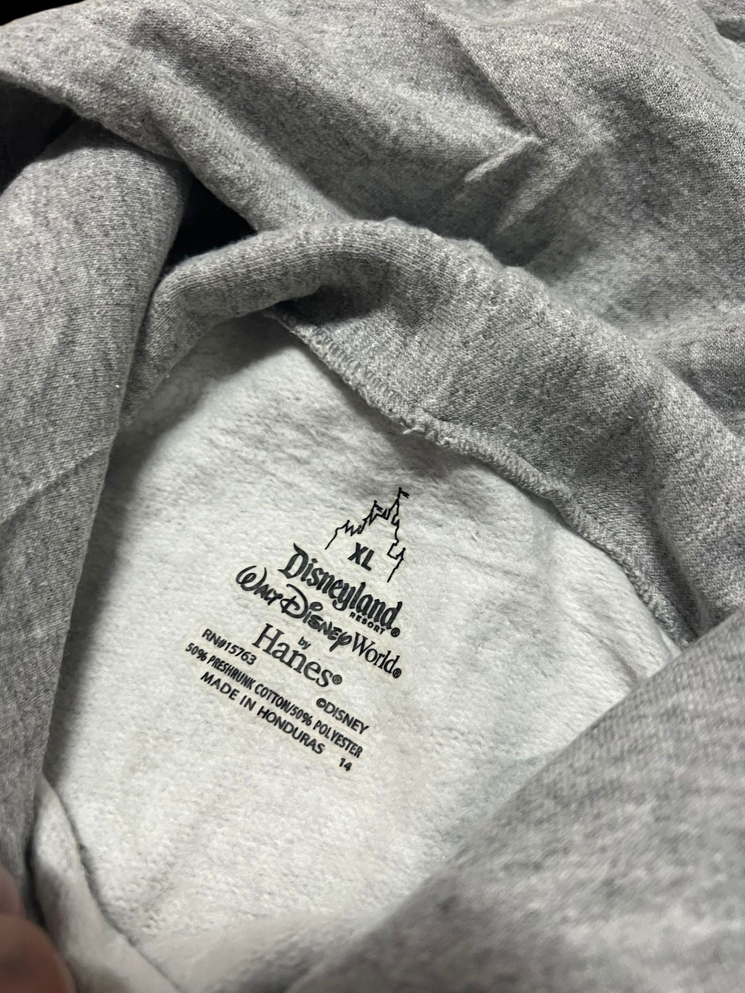 Premier Vintage grey Disneyland Indiana Jones graphic hoodie, 50% cotton/50% polyester, size XL.