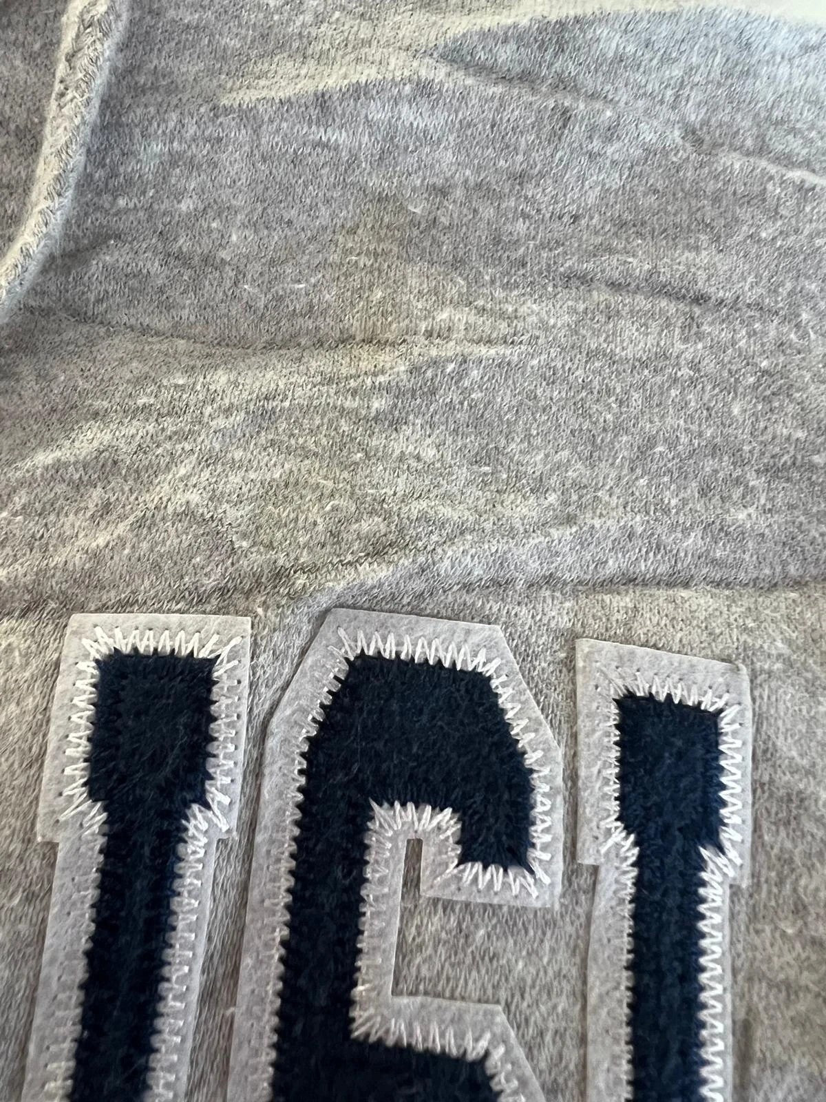 Premier Vintage grey embroidered pullover hoodie with Marco Island Florida graphic. Size S. Features drawstring hood and ribbed cuffs. Note: has a yellow stain.