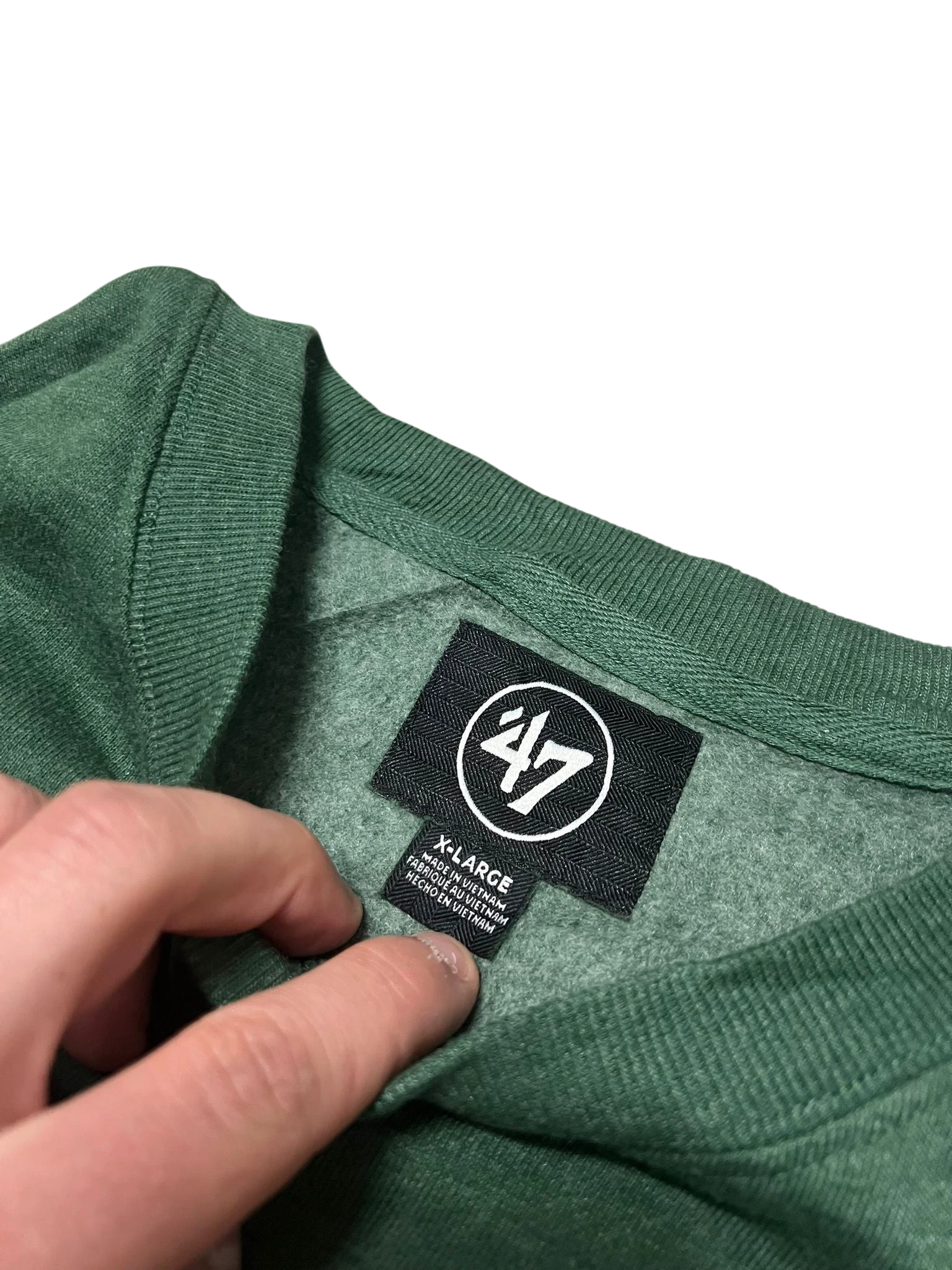 Premier Vintage Milwaukee Bucks crewneck sweatshirt in green with "BUCKS" lettering. Features ribbed cuffs and hem.