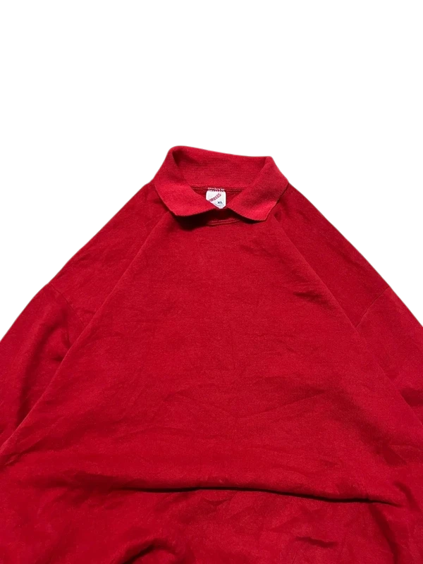 Premier Vintage red pullover jacket with collar and embroidered Patriots Heritage Hills logo. Water-resistant material.