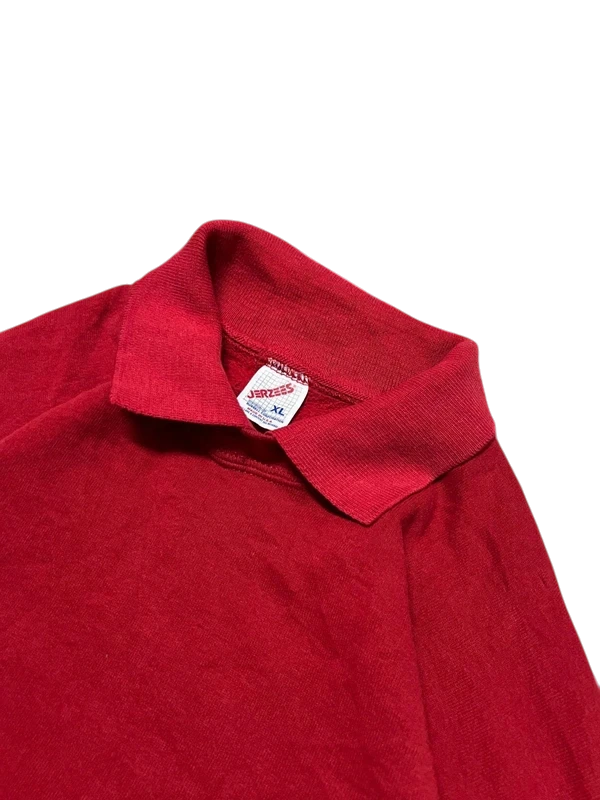 Premier Vintage red pullover jacket with collar and embroidered Patriots Heritage Hills detail.