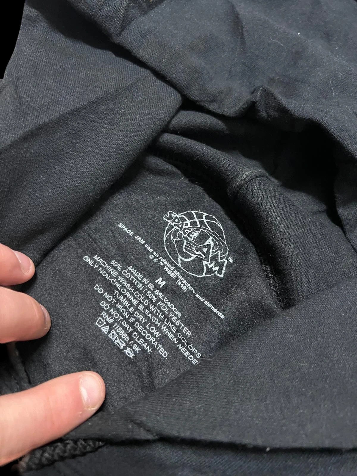 Premier Vintage black cotton blend Space Jam graphic hoodie with drawstring hood and kangaroo pocket, size M.