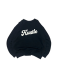 Premier Vintage black crewneck sweatshirt with white embroidered 'Hustle' graphic. Relaxed fit, long sleeves, and soft fabric.
