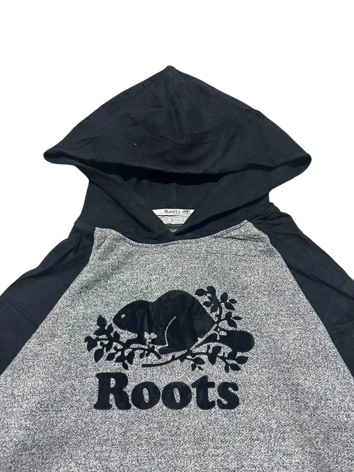 Premier Vintage black and grey raglan sleeve hoodie with Roots beaver logo on chest. Soft, breathable blend for casual wear.