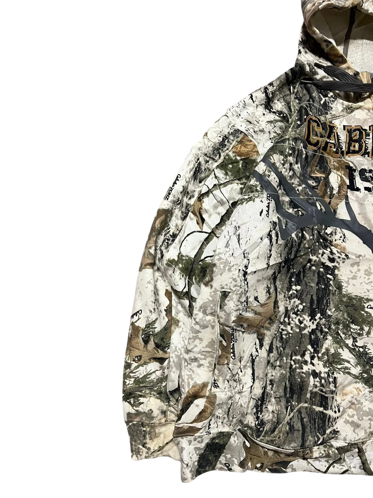 Premier Vintage Cabela's camouflage full zip hoodie with hood, featuring a woodland pattern in green, brown, and white. Durable material.