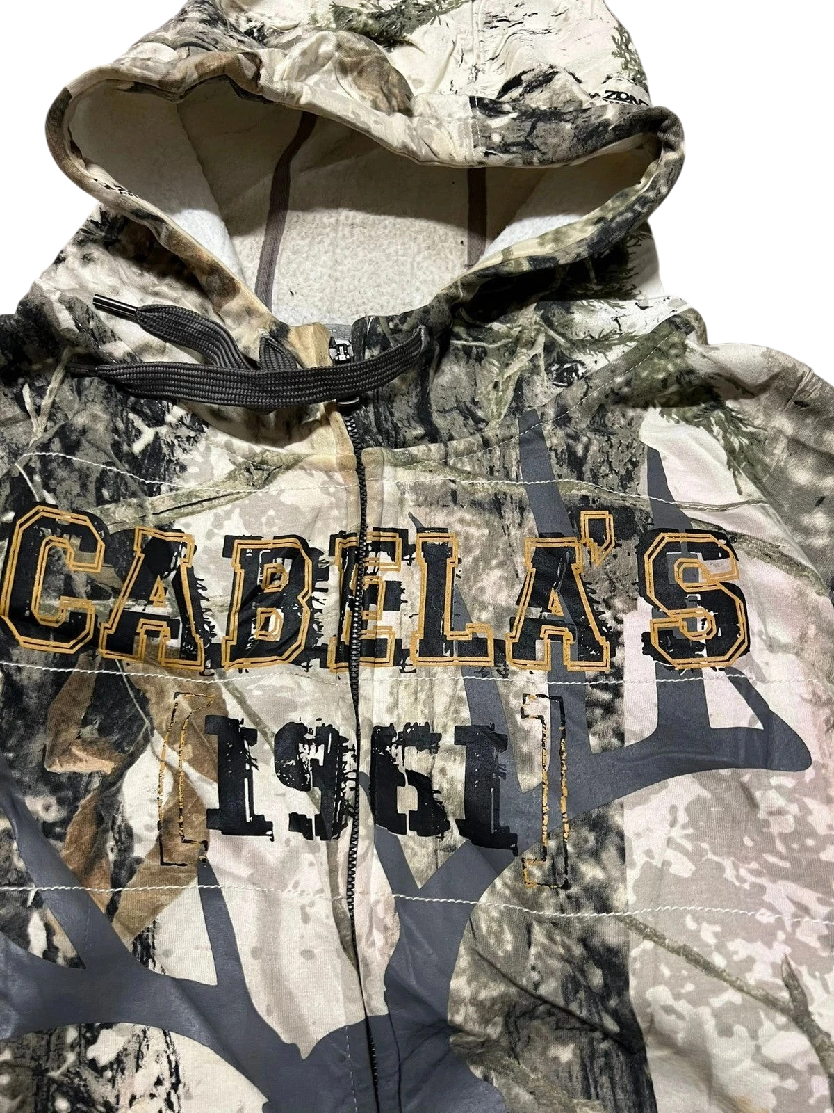 Premier Vintage Cabela's 1961 camouflage full zip hoodie with woodland pattern, drawstring hood, and fleece lining.