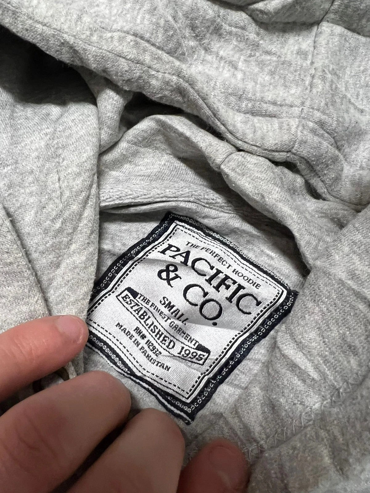 Premier Vintage grey cotton blend graphic hoodie with "MARCO ISLAND FLORIDA" text. Features drawstring hood and ribbed cuffs.