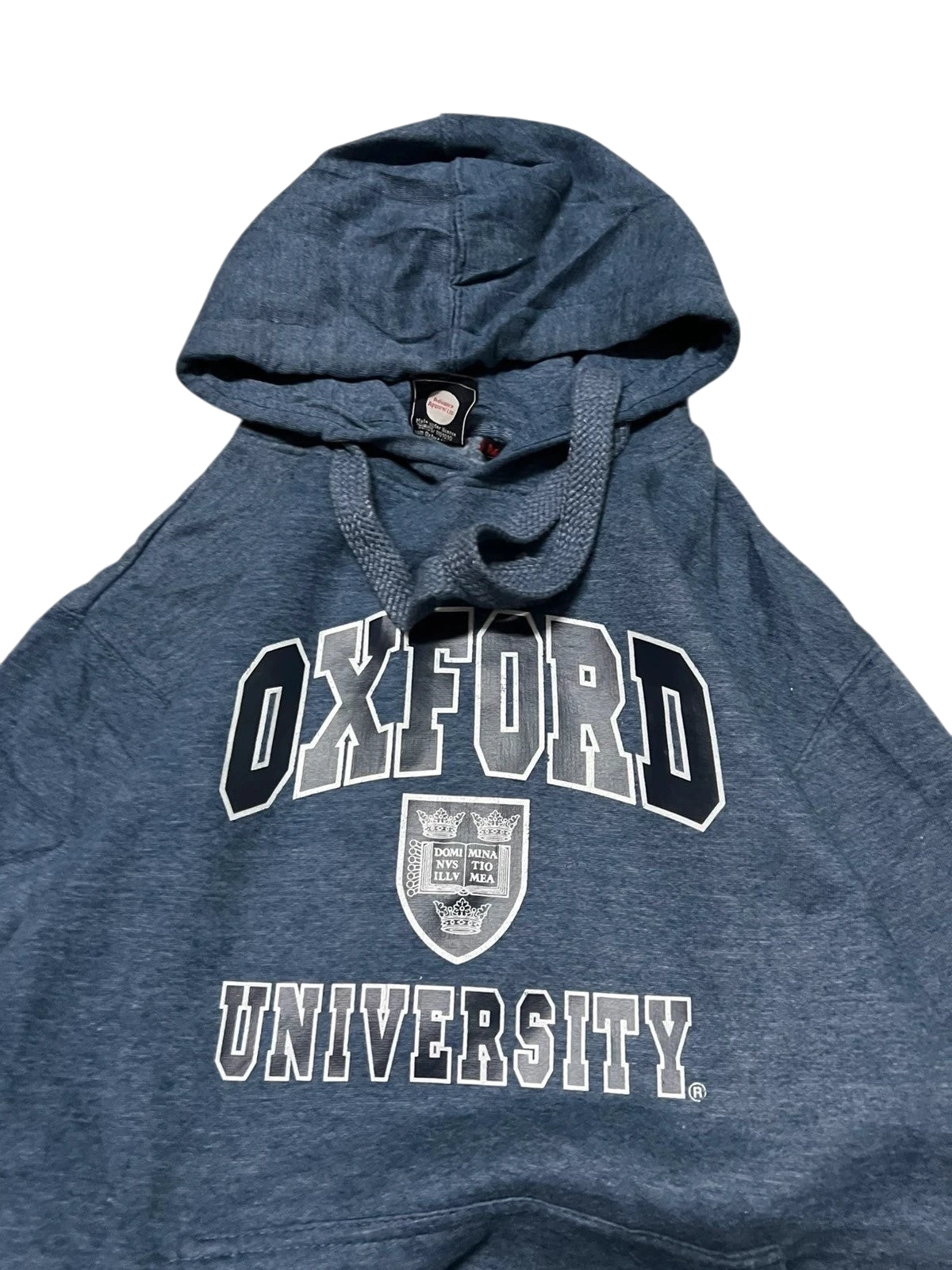 Premier Vintage heathered blue Oxford University graphic hoodie with crest and kangaroo pocket. Officially licensed.