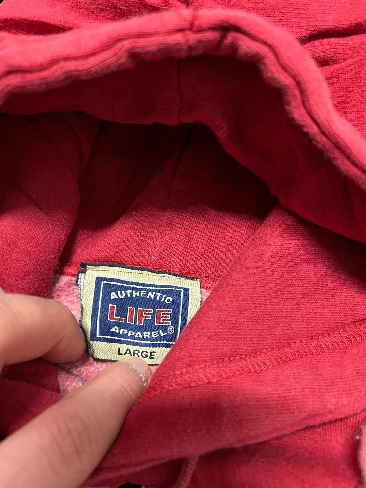 Premier Vintage red cotton blend Missouri hoodie with navy blue text and white trim. Features a kangaroo pocket and adjustable hood.