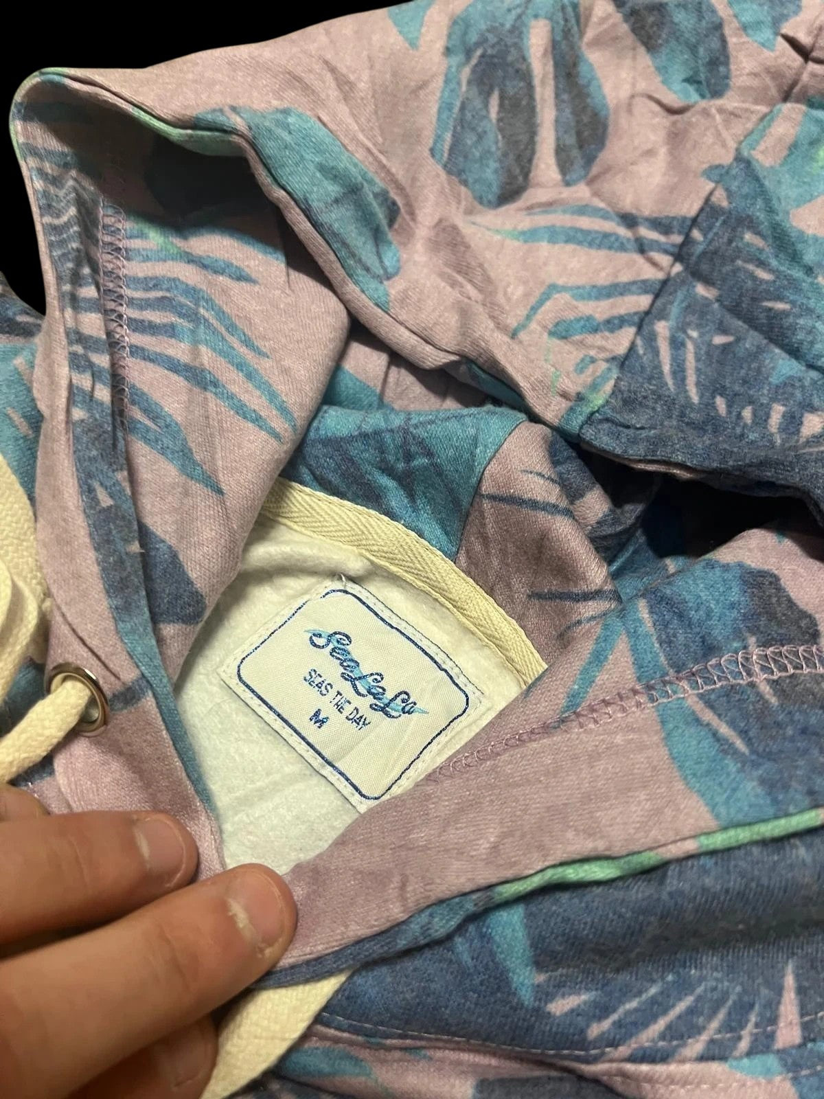 Premier Vintage Hollywood Beach tropical hoodie with pink, blue, and green palm leaf print. Features drawstring hood and relaxed fit.