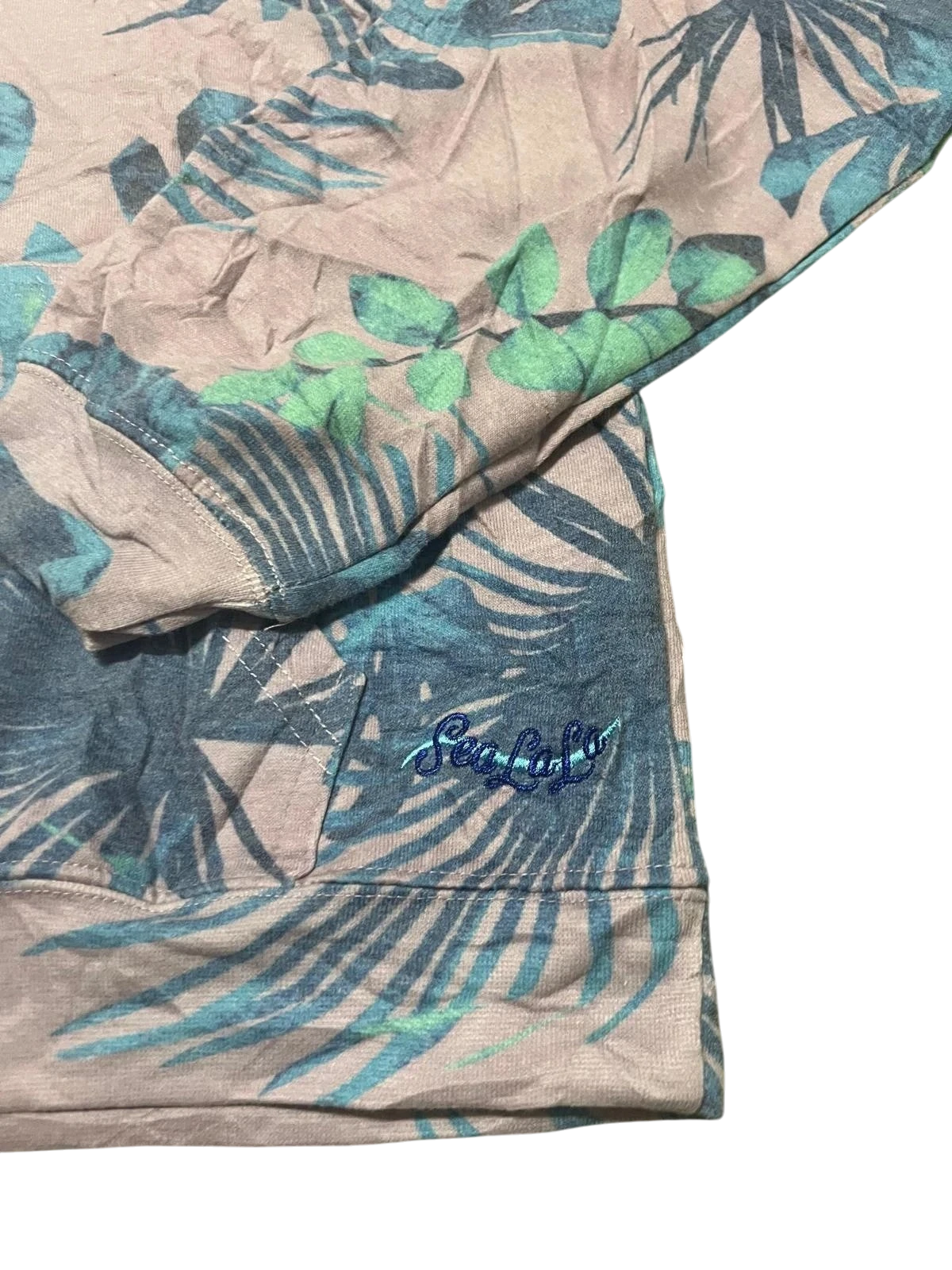 Premier Vintage Hollywood Beach tropical hoodie with palm leaf print in pink, blue, and green. Features embroidered text.